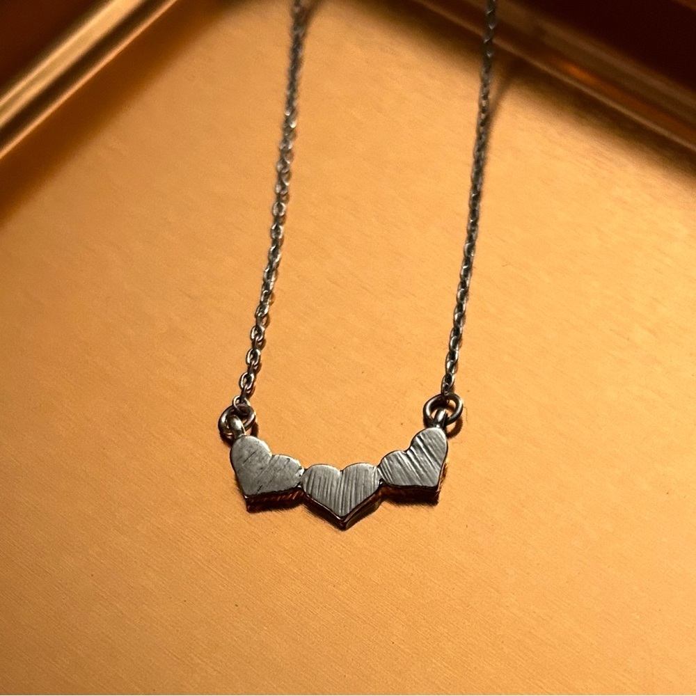Silver triple heart necklace